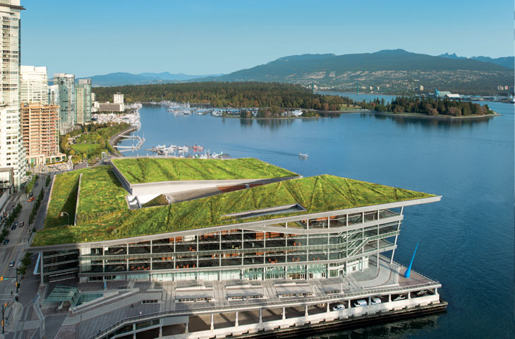 A photograph of the Vancouver Convention Center overlooking the water